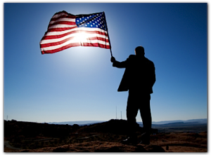 small manholdingflag copy 300x221 Freedom Leadership: America’s Opportunity