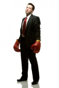 businessmanwithgloves businessmanwithgloves 200x300 10 Financial Myths to Defeat in Economic Downturns