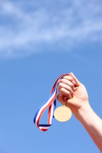 medalinhand 200x300 Victim or Victor?